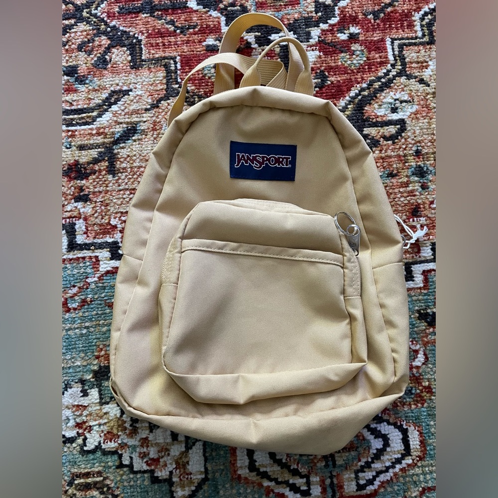 Jansport mini backpack in Curry